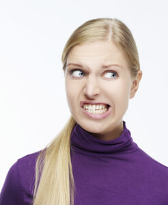 Blonde-Girl-Grinding-Teeth